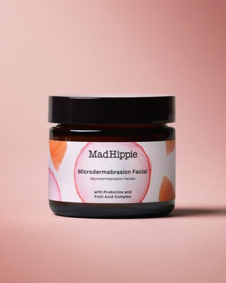 Microdermabrasion Facial Jar on Pink Background