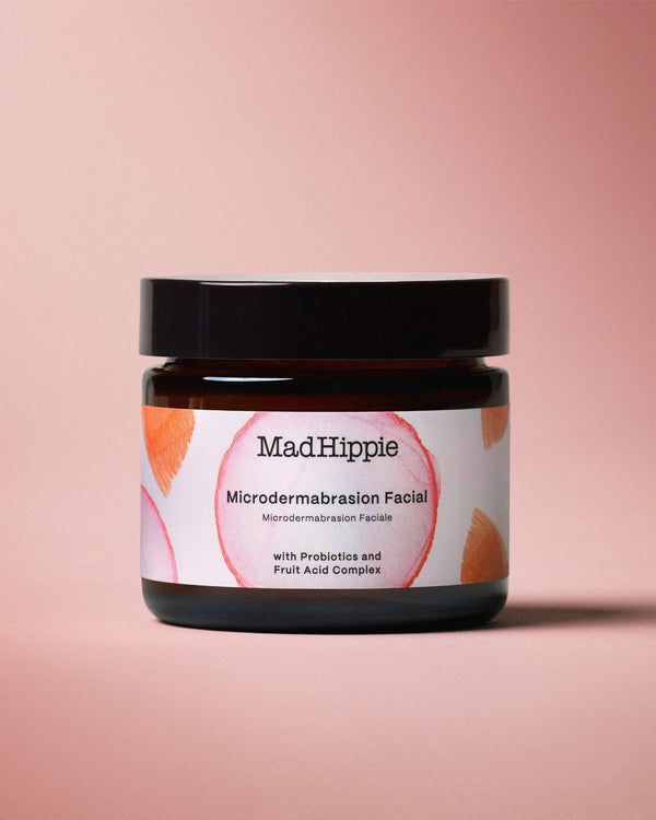 Microdermabrasion Facial Jar on Pink Background