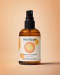 Vitamin C Toning Mist Bottle on Peach Background