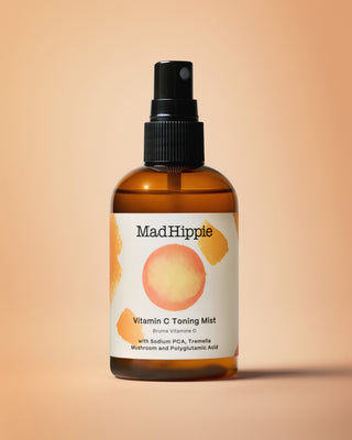 Vitamin C Toning Mist Bottle on Peach Background